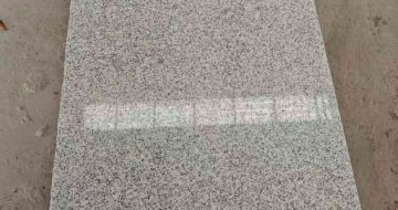 丽水芝麻白光面毛板