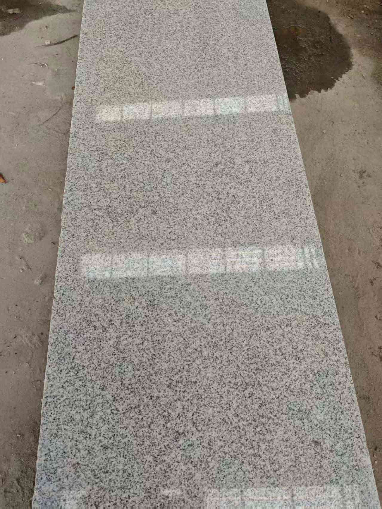 丽水芝麻白光面毛板